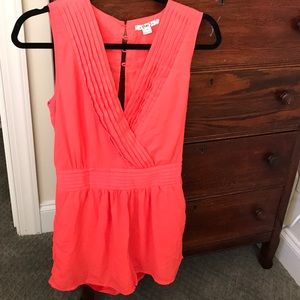 Almost a neon orange romper